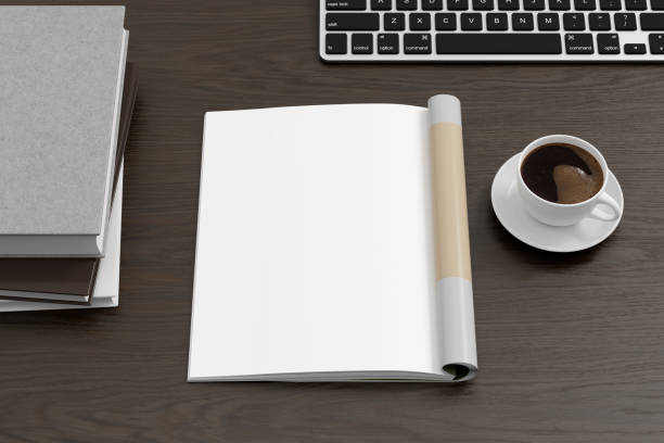 istock Magazine left-hand page mockup on black wooden workplace desk 1873154643
