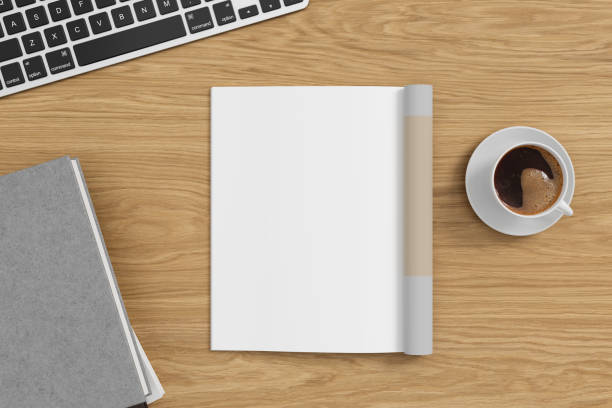 istock Magazine left-hand page mockup on wooden workplace desk 1873155669