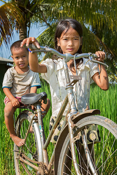 istock Asian Boy and girl on bicycle 187316974