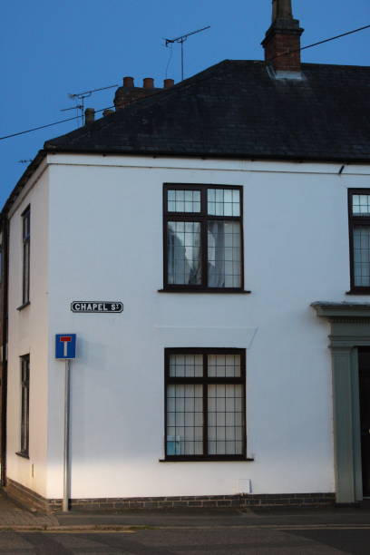 istock Corner of white rendered modern house 1873180303