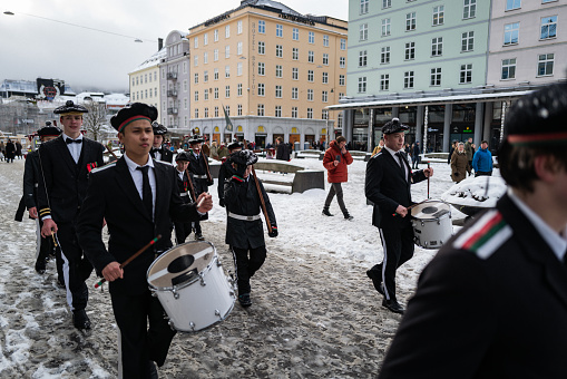 Bergen, Norway - February 1, 2023: Buekorps tamburine parade in the city center of Bergen on February 1, 2023 in Bergen, Norway. Buekorps tamburine parade (\
