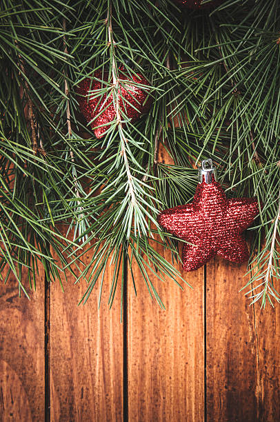 istock Christmas decoration ornaments on pine tree 187318375