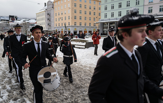 Bergen, Norway - February 1, 2023: Buekorps tamburine parade in the city center of Bergen on February 1, 2023 in Bergen, Norway. Buekorps tamburine parade (\