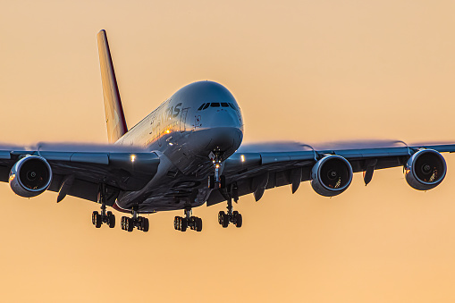 London, UK - August 8, 2023: Airbus A380 Qantas airlines approaching early morning to London Heathrow Airport