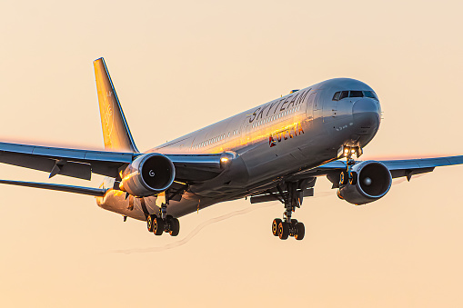 London, UK - August 8, 2023: Boeing 767 Delta Airlines in Skyteam livery approaching early morning to London Heathrow airport.