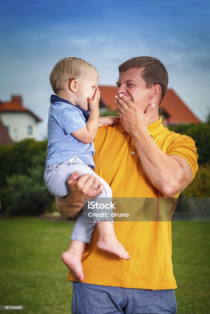 Faher and son playing 30-39 Years Stock Photo