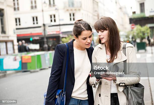 Young Women On Paris Streets Stock Photo - Download Image Now - Business, Digital Tablet, France