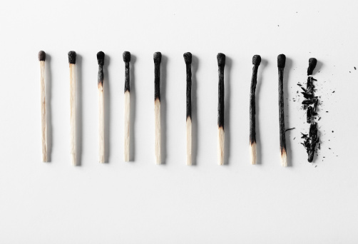 Burned matches placed in a row starting from not burned till completely burned match.