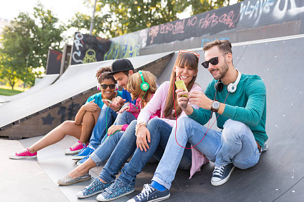 istock Young people having fun at the skatepark 187321725