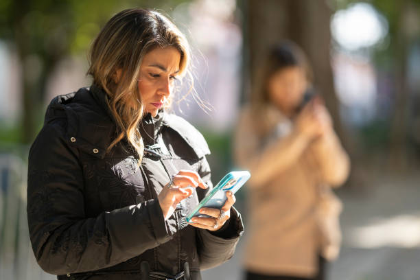 istock Portrait of woman using smartphone 1873222402