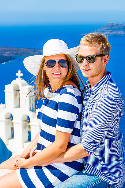 istock Happy young couple on Santorini island, Greece 187324677