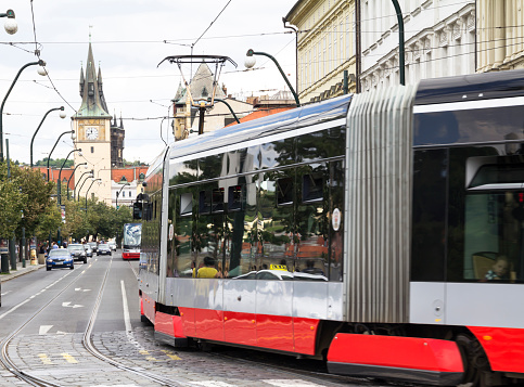 Tram at old street in Prague, Czech Republic. Prague historical Center, including most of the city major sites, became a Unesco-listed site in 1992.