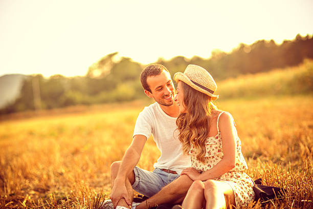 istock Smiling couple outdoors 187325362
