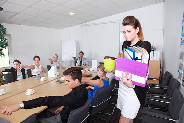 istock Woman getting fired at meeting 187326499