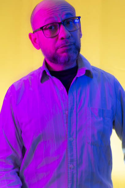 istock Bald, bearded man wearing prescription glasses 1873267703