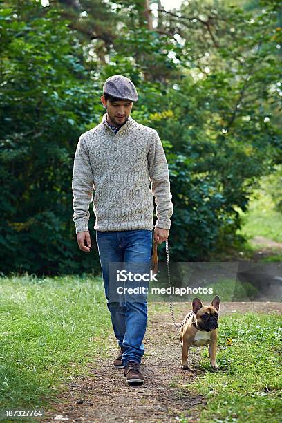 Stylish Dog Owner Stock Photo - Download Image Now - Men, Walking, Casual Clothing