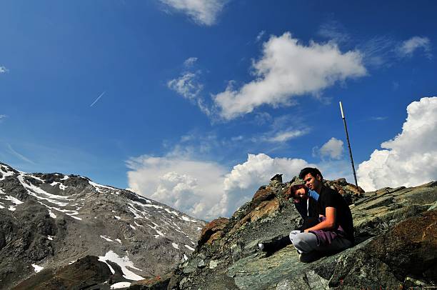 istock Young Couple Having Fun Around Alps Switzerland 187328673