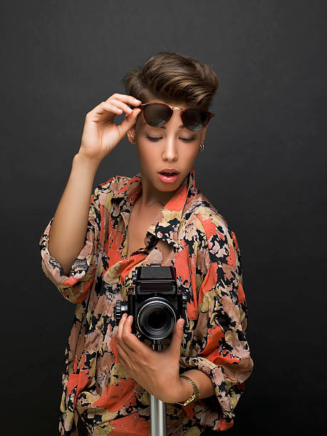 istock Young woman photographer 187328776
