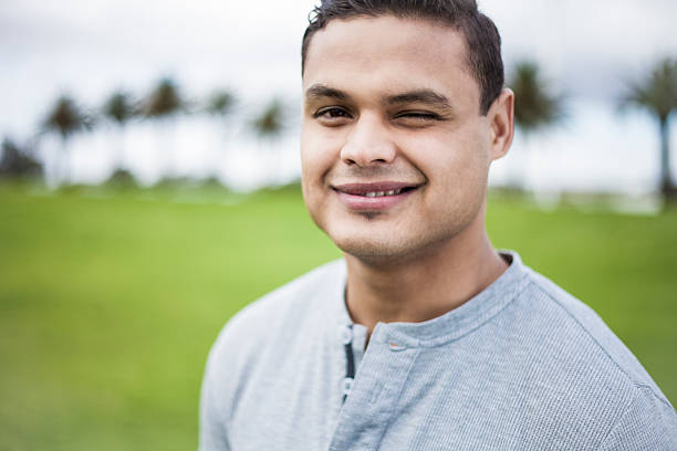 istock Portrait of a young man winking 187328844