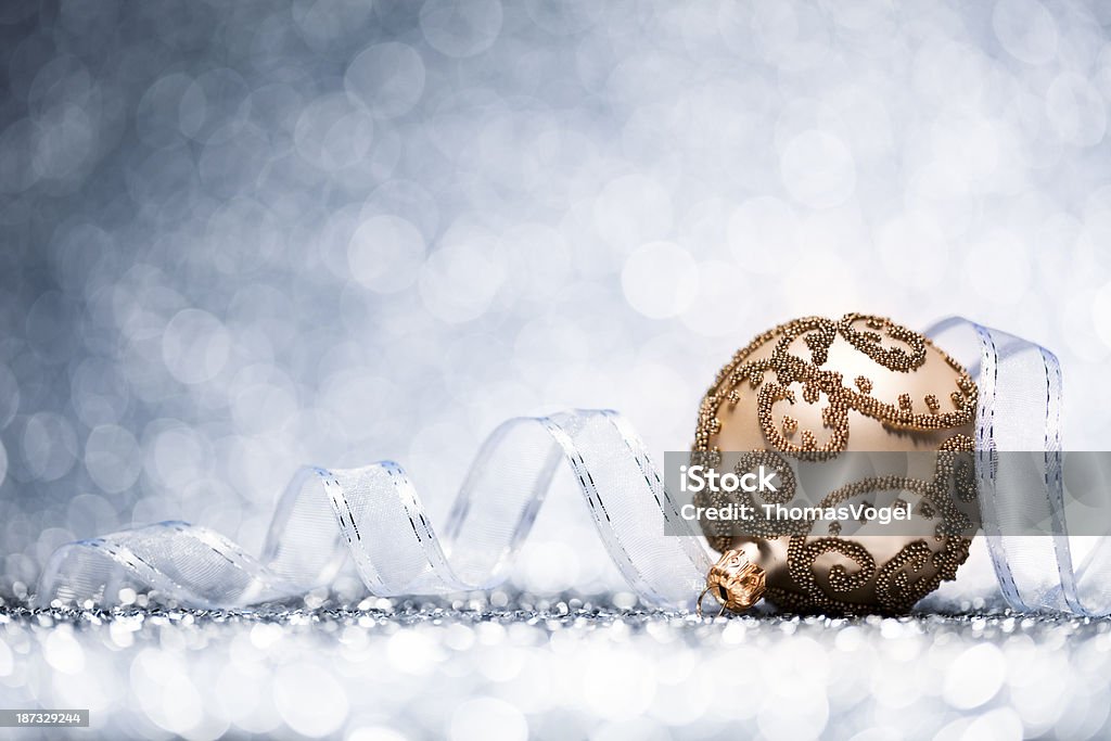 Christmas Bauble - Decoration Glitter Bokeh Winter Gold http://thomasvogel.eu/istock/is_christmas.jpg Blue Stock Photo