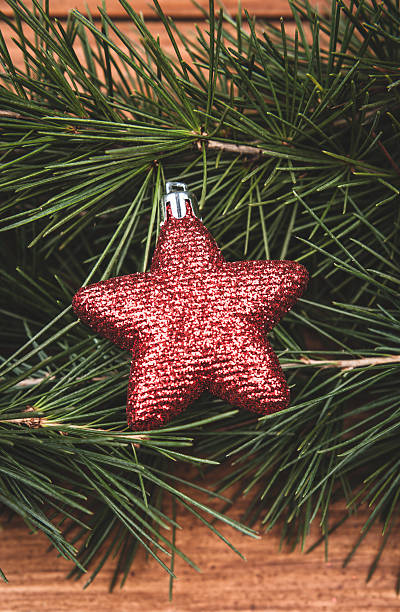 istock Christmas decoration ornaments on pine tree 187329431
