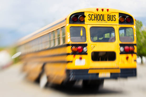 scuolabus - school bus defocused education bus foto e immagini stock