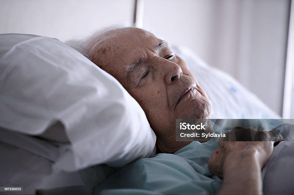 Senior Old man sleeping in a hospital Senior Adult Stock Photo