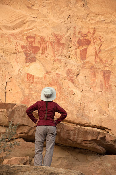 istock Woman admires Sego Canyon rock art panel Utah 187330101