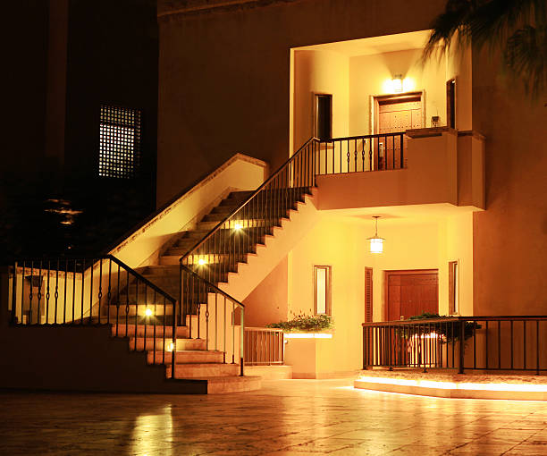 istock staircase at residential complex entrance night time 187330292
