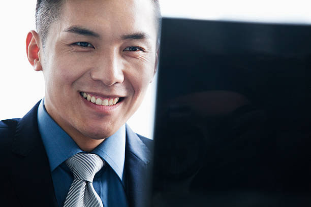 istock Businessman smiling in office 187332771