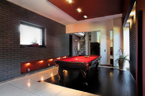 Contemporary interior, living room with a snooker table