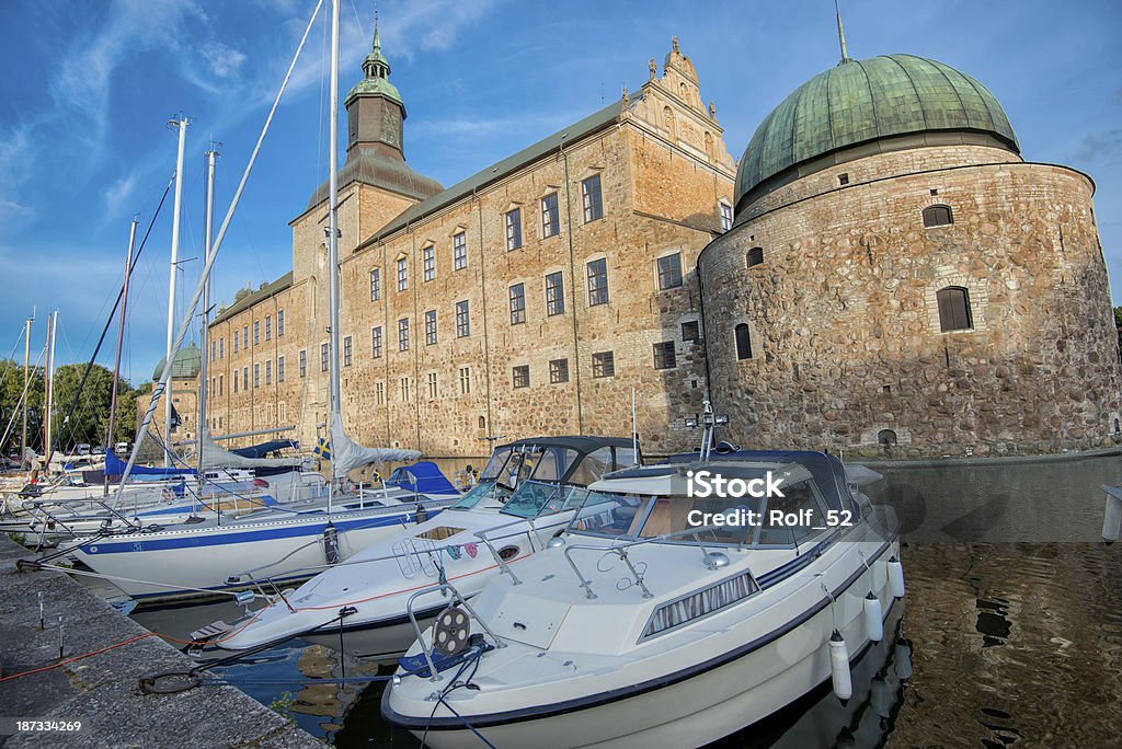 Vadstena Castle, Sweden A summer evening at Vadstena Castle in Ostergotland, Sweden. The castle was built in 1545 as a Royal Castle by king Gustav I. Today Vadstena is a popular destination for leisure boats and tourists. Castle Stock Photo