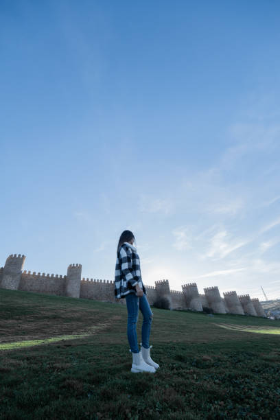 istock Casual tourist explores sunny Avila. 1873344424