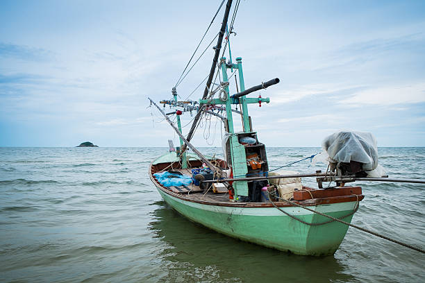 istock Old Thai green fishing boat 187334903