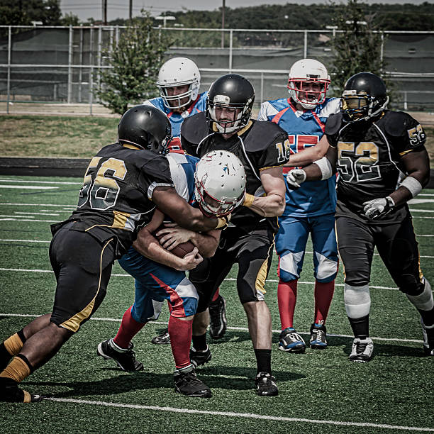 istock Football play in progress - VI 187337009