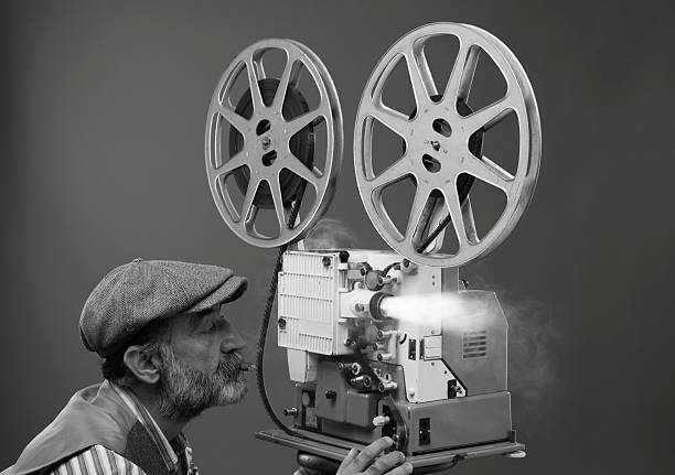 Film projectionist starting movie stock photo