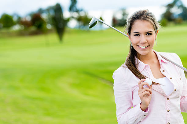 istock Beautiful female golfer 187337736