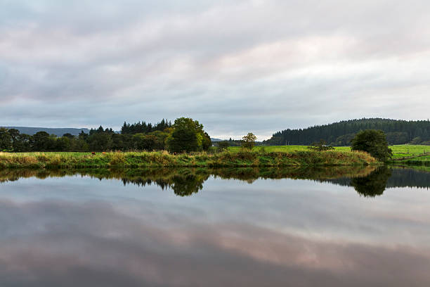 Mosstowie, mirrored grey sunset. This is a dam within the area of Mosstowie, Elgin, Moray, Scotland, United Kingdom. moray firth stock pictures, royalty-free photos & images