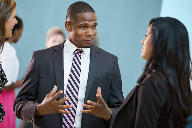 istock Diverse group of young executives having discussion after meeting 187338230