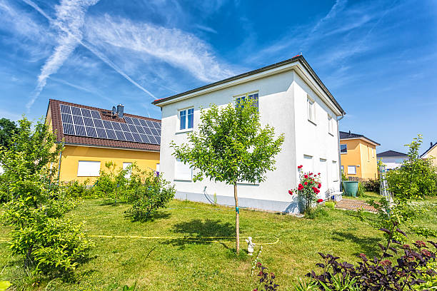 istock Houses with garden and solar panels 187340098