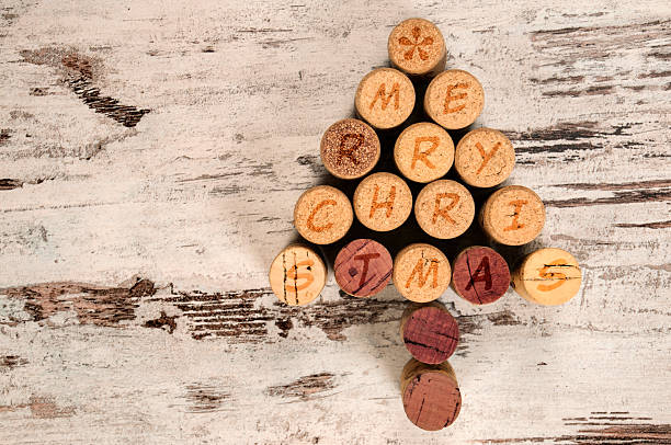 istock Lettered wine corks arranged to say Merry Christmas  187342483