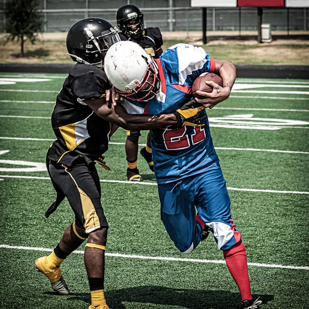 istock Football play in progress - XII 187342880