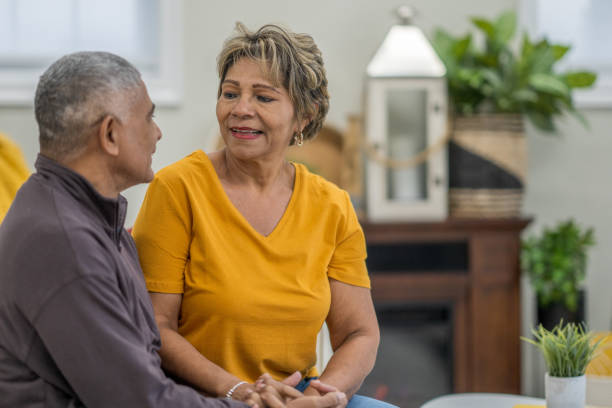 istock Senior Couple Relaxing at Home Together 1873431877