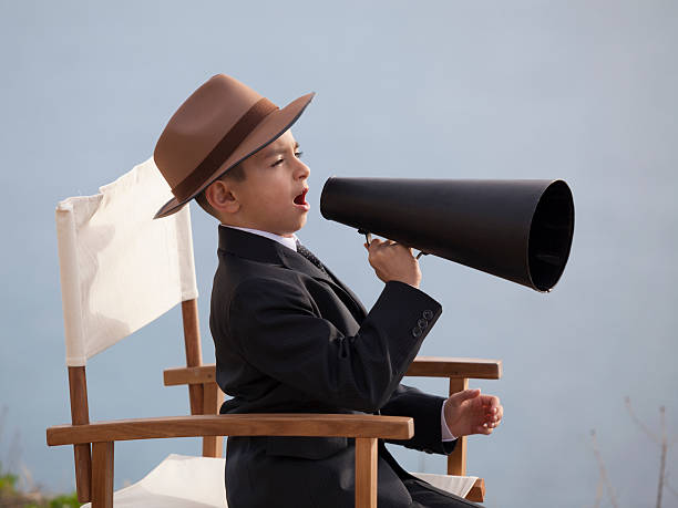 istock Little film director in action 187343499