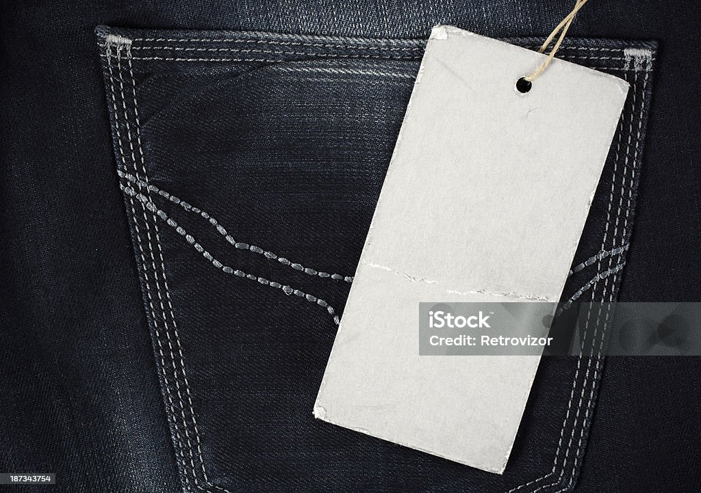 Etichetta di jeans bianco - Foto stock royalty-free di Abbigliamento