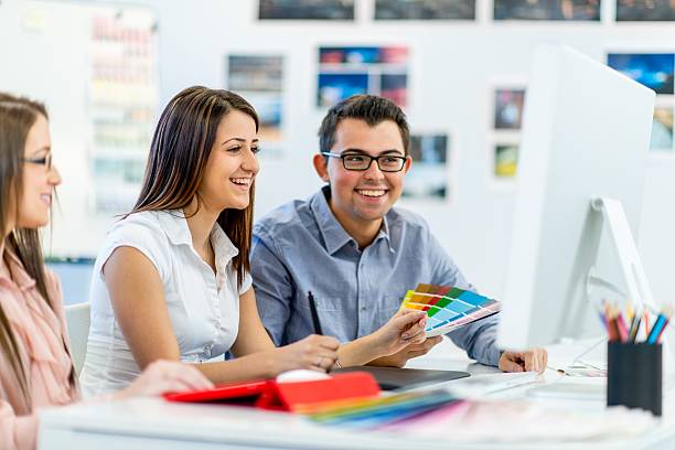 istock Young designers or photographers 187343986