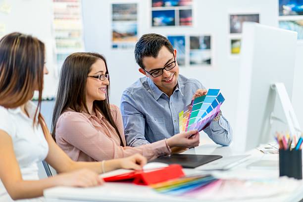 istock Young designers or photographers 187343994