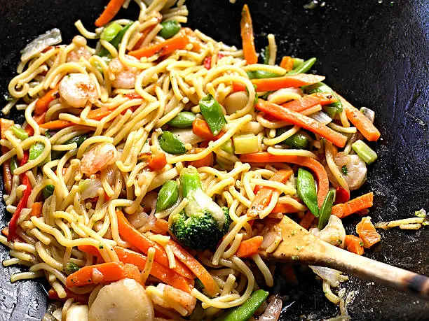 Stir Fried Noodle with vegetable in Wok.