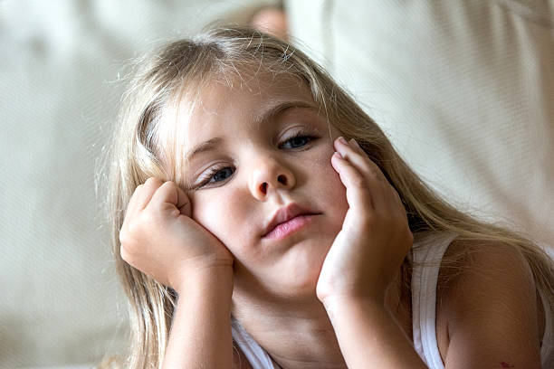 istock Pensive little girl 187344785