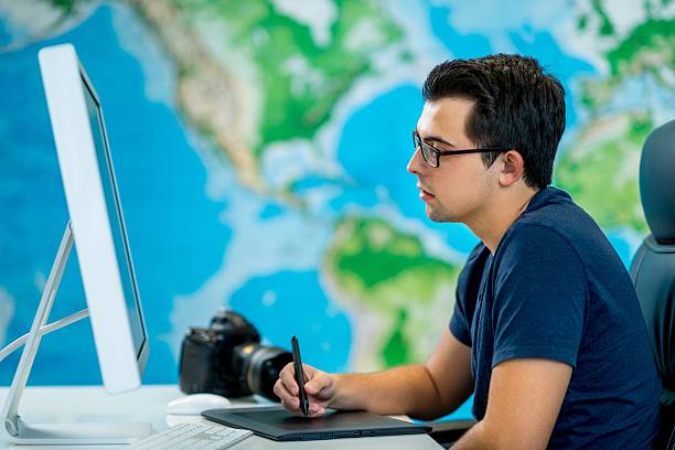 istock Young designers or photographers 187344921
